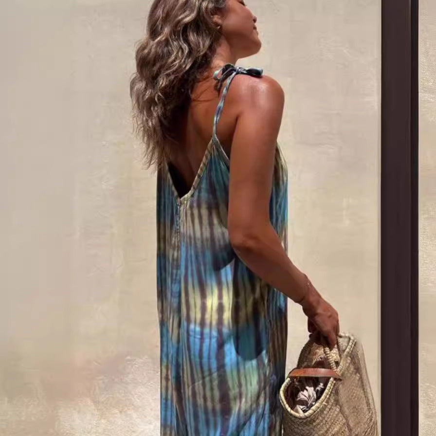Women's jumpsuit – loose fit – adjustable straps – V-neck – tie belt – pattern