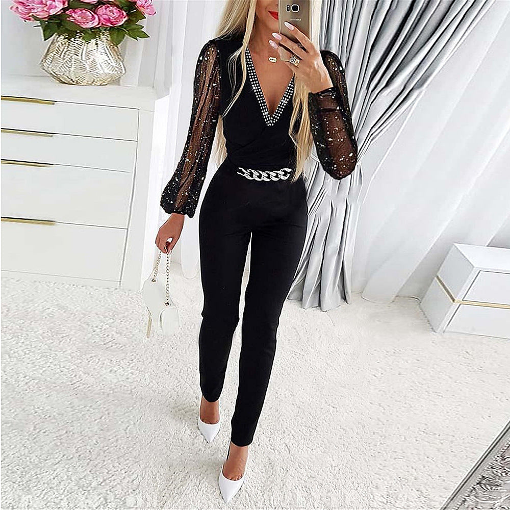 Women's jumpsuit – Slim fit – V-neckline with diamond details – Cut sleeves – Chain belt