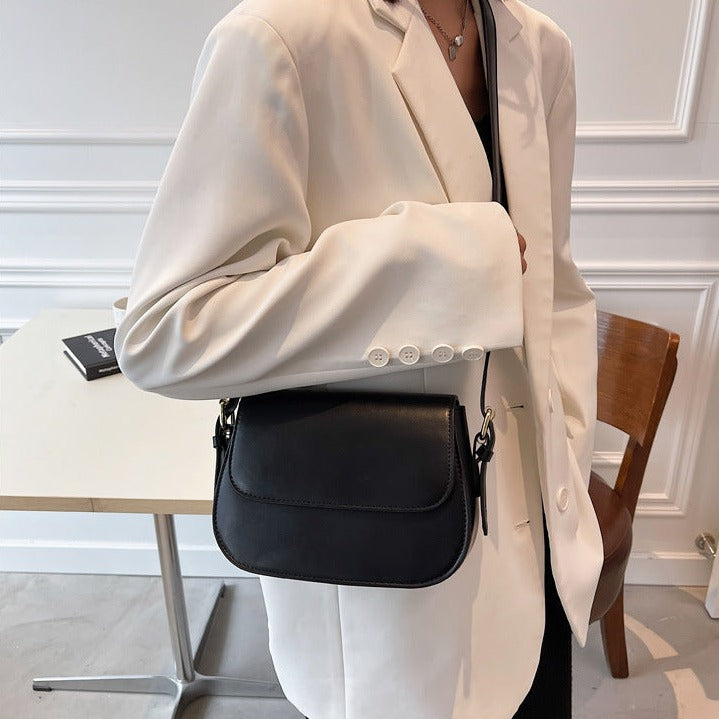 Women's Crossbody Bag – Elegant Design – Adjustable Strap – Flap Closure – Metallic Details