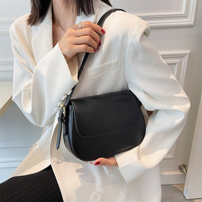 Women's Crossbody Bag – Elegant Design – Adjustable Strap – Flap Closure – Metallic Details