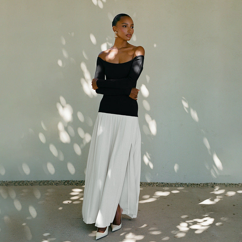 Dress woman – off-shoulder – fitted waist – long sleeves – pleated maxi skirt