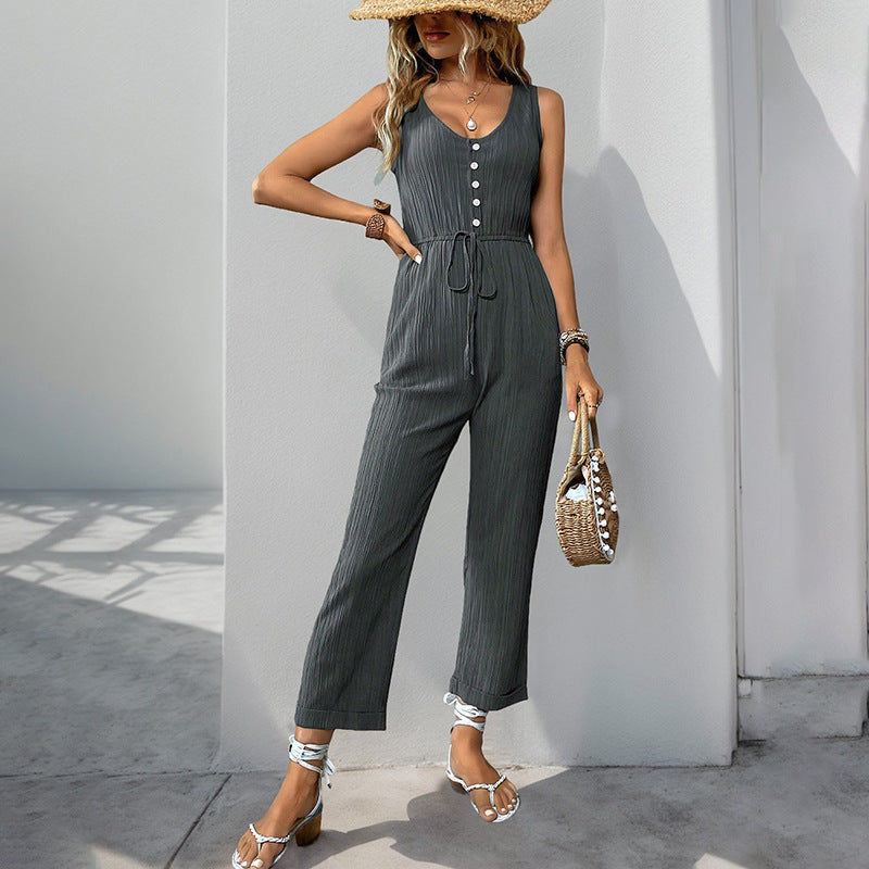 Dame jumpsuit – Ermeløs V-hals – Teksturert stoff – Avslappet passform – Belte i midjen