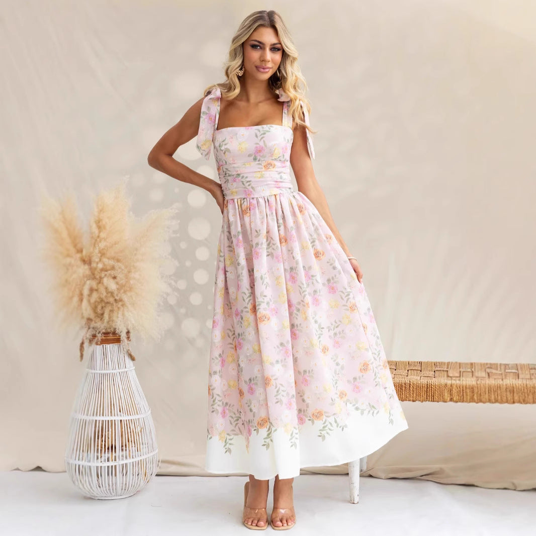 Damekjole midi – blomsterprint – lett stoff – spagettistropper – utsvingt passform