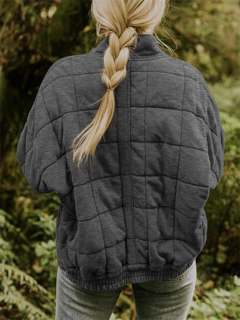 Jakke med glidelås, lommer og quilting for kvinner