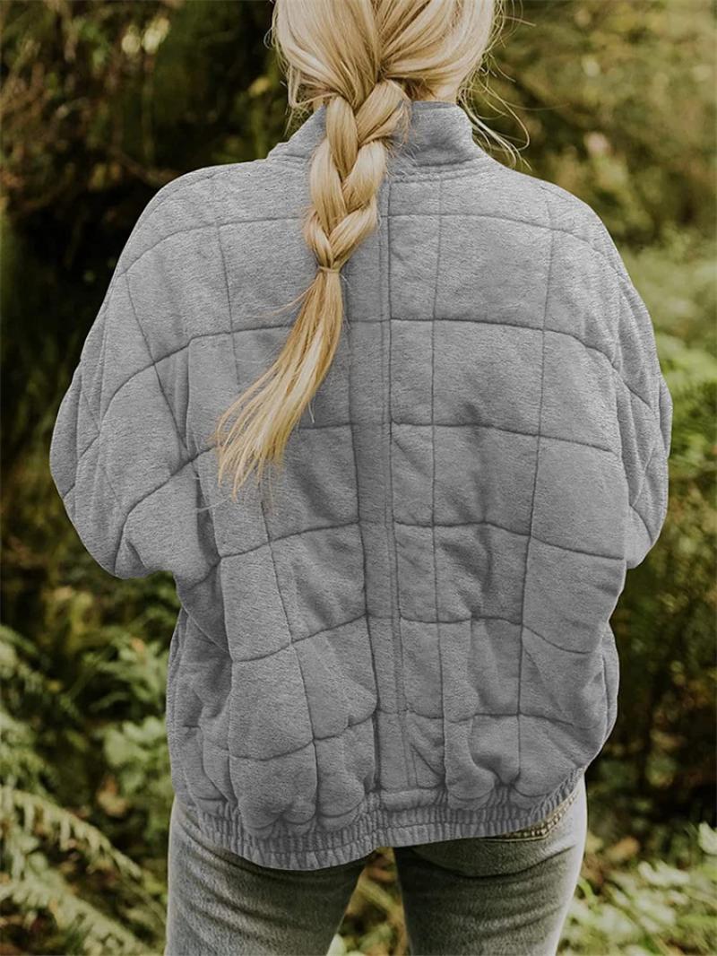 Jakke med glidelås, lommer og quilting for kvinner