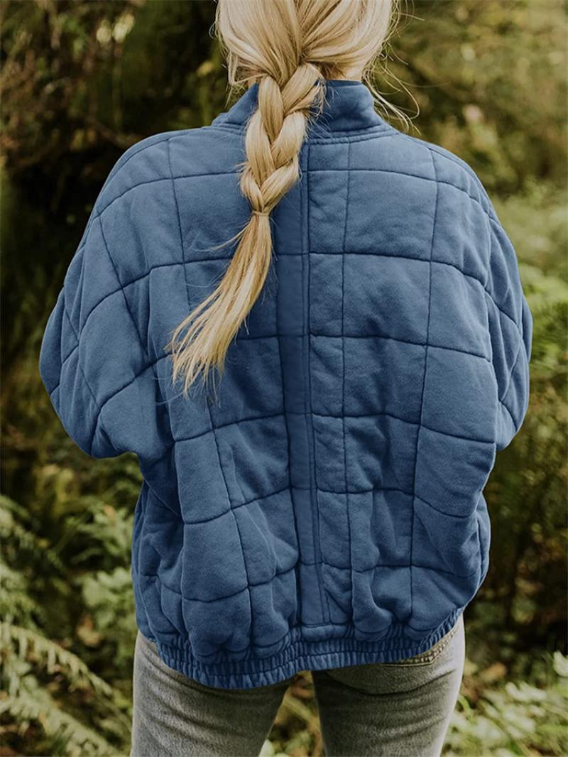 Jakke med glidelås, lommer og quilting for kvinner