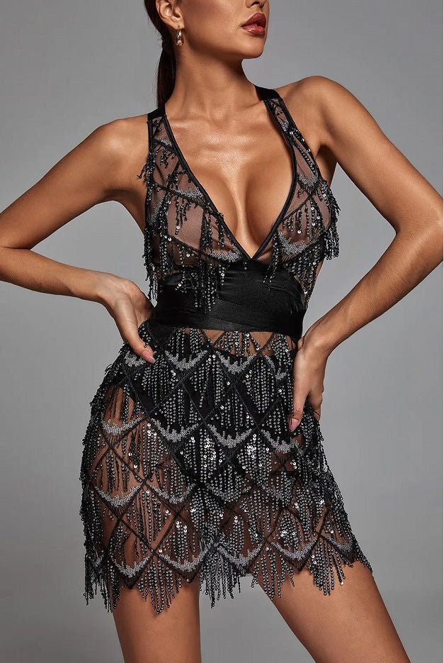 Dress woman – Midi length – Tight fit – Deep V-neck – Sequins and fringes