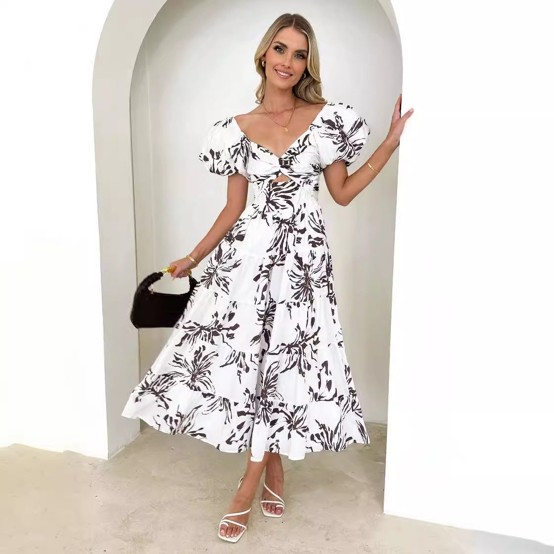 Dress woman – Maxi – Flared fit – Puff sleeves – Cut-out waist – Patterned tiered skirt