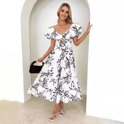 Dress woman – Maxi – Flared fit – Puff sleeves – Cut-out waist – Patterned tiered skirt