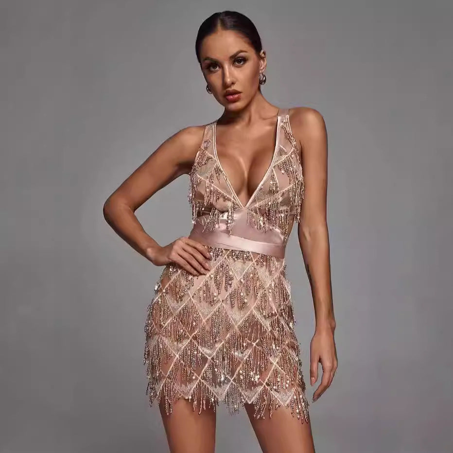 Dress woman – Midi length – Tight fit – Deep V-neck – Sequins and fringes