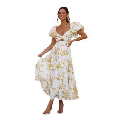 Dress woman – Maxi – Flared fit – Puff sleeves – Cut-out waist – Patterned tiered skirt