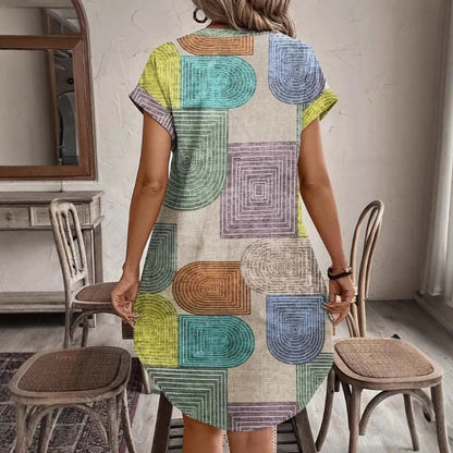 Dress woman – Relaxed fit – Knee-length – V-neck – Short sleeve – Geometric pattern – Breathable fabric – Buttons front