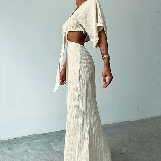 Dress woman – maxi length – slim fit – V-neckline – waist cut – open back – short sleeves