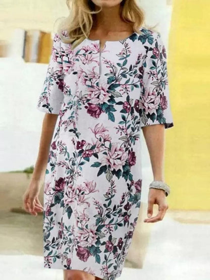 Fanny - Designerkjole med halvermet erme